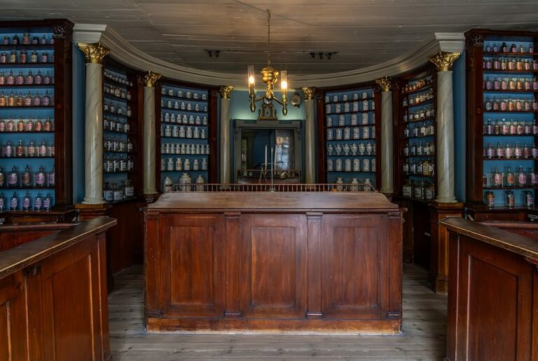 Pharmacy Museum and Qwensel House in Turku, Finland This is a photo of the inside of the museum with cherry wood interior and many medicine bottles in glass